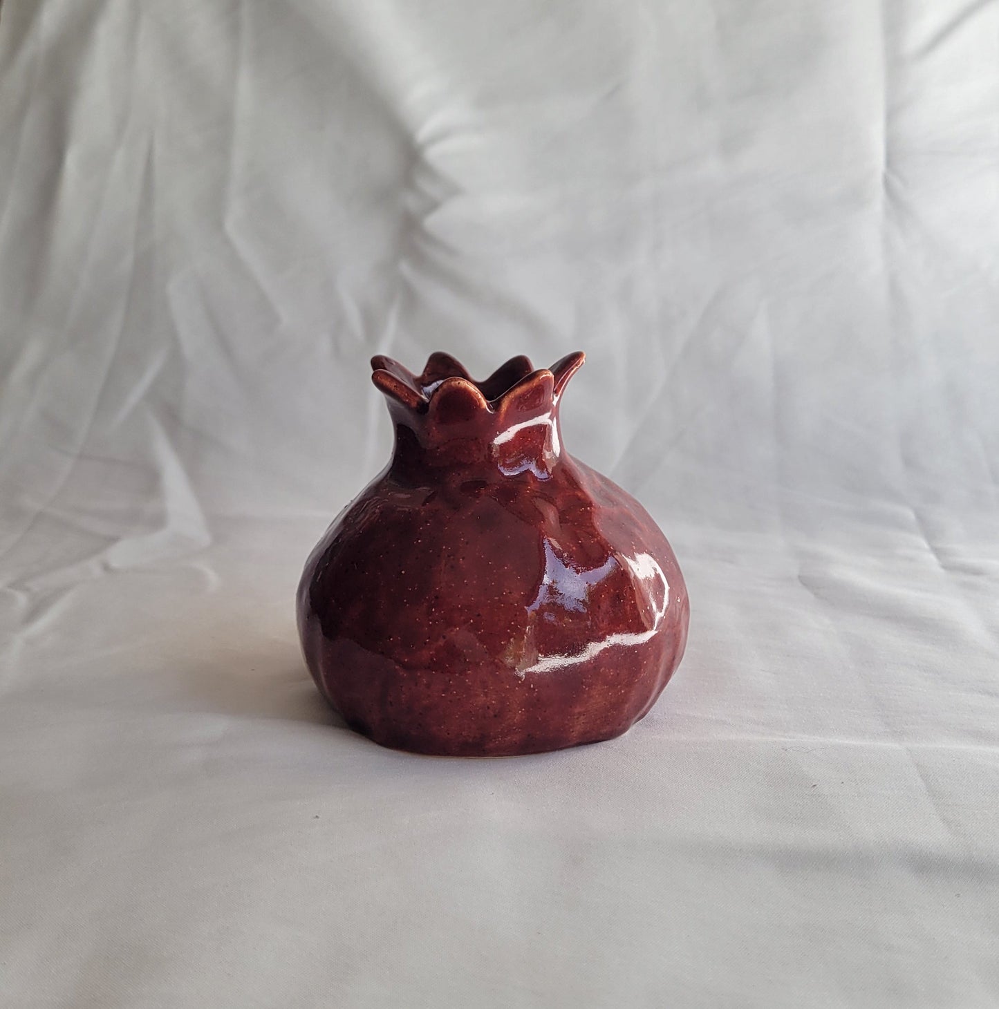 Pomegranate candle holder